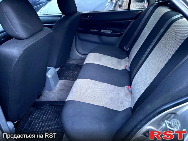 Мицубиси Лансер, объемом двигателя 1.3 л и пробегом 230 тыс. км за 2800 $, фото 9 на Automoto.ua