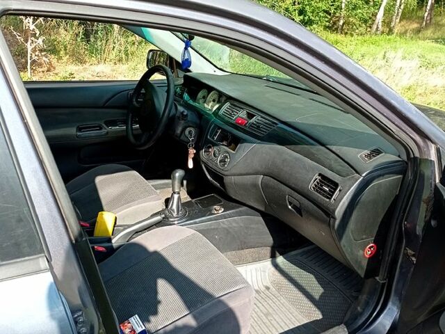 Мицубиси Лансер, объемом двигателя 1.6 л и пробегом 256 тыс. км за 1500 $, фото 2 на Automoto.ua