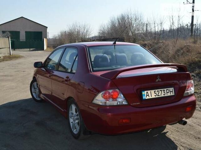 Міцубісі Lancer, об'ємом двигуна 2 л та пробігом 279 тис. км за 4550 $, фото 21 на Automoto.ua