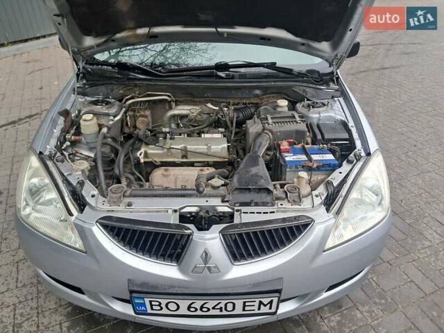 Мицубиси Лансер, объемом двигателя 1.6 л и пробегом 311 тыс. км за 4000 $, фото 6 на Automoto.ua