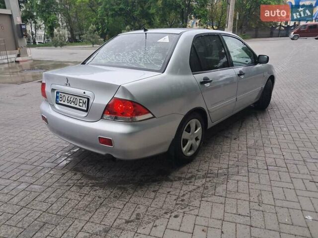 Мицубиси Лансер, объемом двигателя 1.6 л и пробегом 311 тыс. км за 4000 $, фото 3 на Automoto.ua