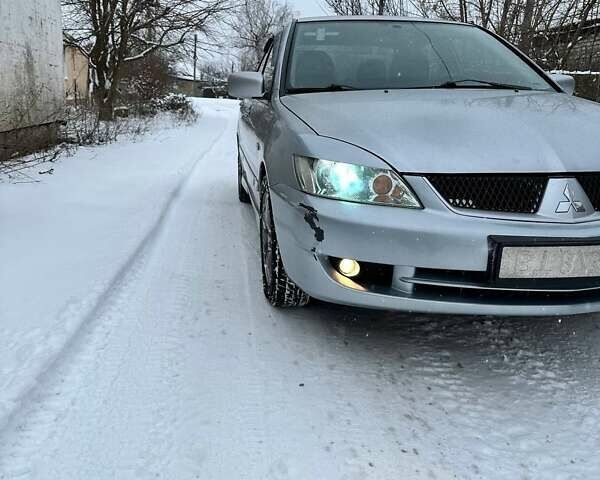 Мицубиси Лансер, объемом двигателя 1.58 л и пробегом 330 тыс. км за 4790 $, фото 20 на Automoto.ua