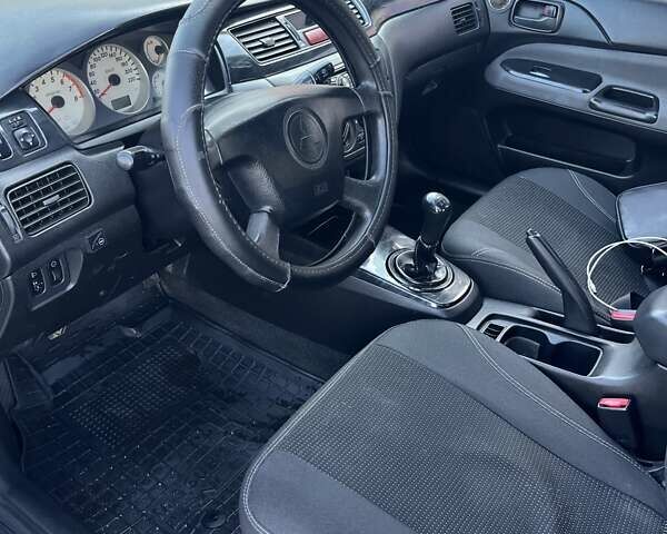 Мицубиси Лансер, объемом двигателя 1.58 л и пробегом 230 тыс. км за 4700 $, фото 10 на Automoto.ua