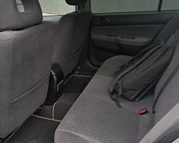 Мицубиси Лансер, объемом двигателя 1.6 л и пробегом 311 тыс. км за 4000 $, фото 4 на Automoto.ua