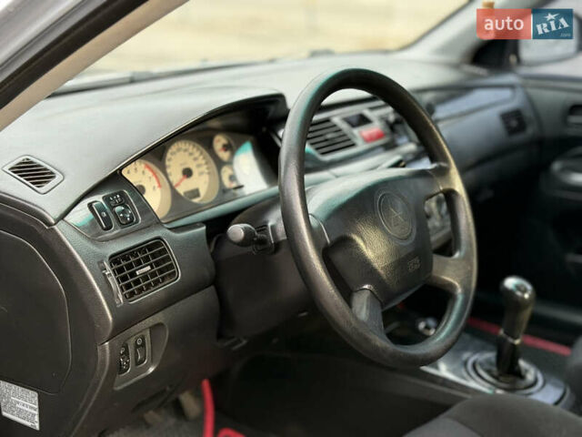 Мицубиси Лансер, объемом двигателя 1.6 л и пробегом 230 тыс. км за 3700 $, фото 5 на Automoto.ua