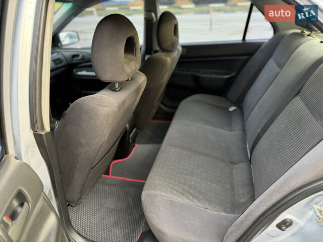 Мицубиси Лансер, объемом двигателя 1.6 л и пробегом 230 тыс. км за 3700 $, фото 7 на Automoto.ua