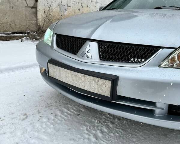 Міцубісі Lancer, об'ємом двигуна 1.58 л та пробігом 330 тис. км за 4790 $, фото 22 на Automoto.ua