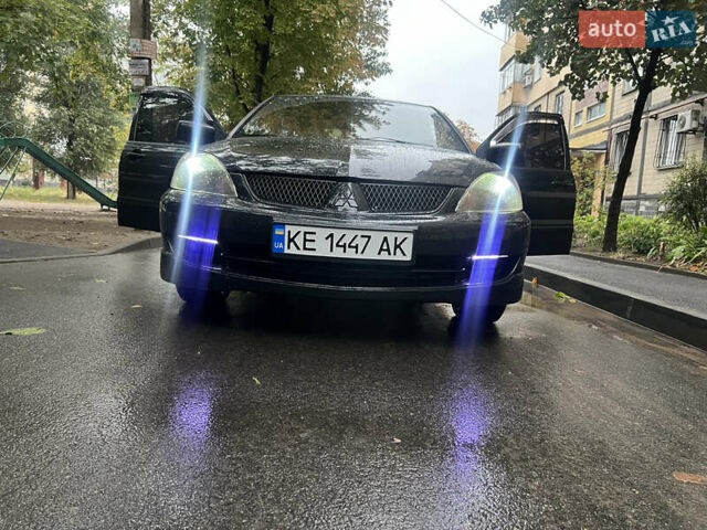Мицубиси Лансер, объемом двигателя 2 л и пробегом 299 тыс. км за 4950 $, фото 11 на Automoto.ua