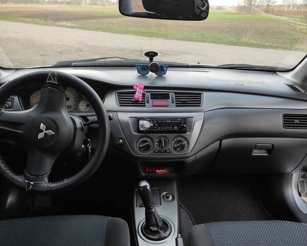 Міцубісі Lancer, об'ємом двигуна 1.58 л та пробігом 228 тис. км за 5250 $, фото 11 на Automoto.ua