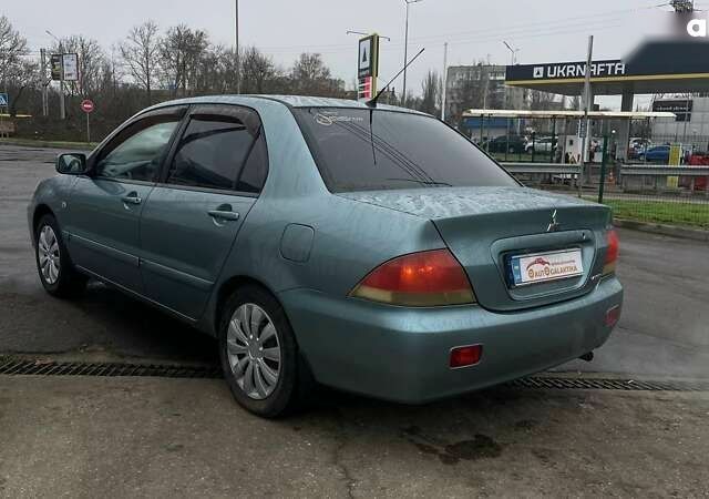 Мицубиси Лансер, объемом двигателя 1.6 л и пробегом 262 тыс. км за 3999 $, фото 4 на Automoto.ua