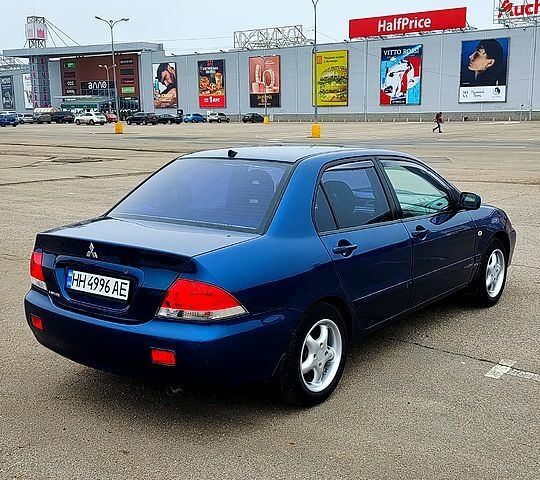 Міцубісі Lancer, об'ємом двигуна 1.6 л та пробігом 195 тис. км за 4700 $, фото 11 на Automoto.ua