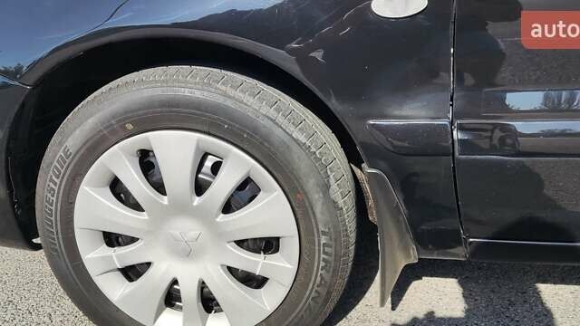 Мицубиси Лансер, объемом двигателя 1.6 л и пробегом 132 тыс. км за 5490 $, фото 11 на Automoto.ua