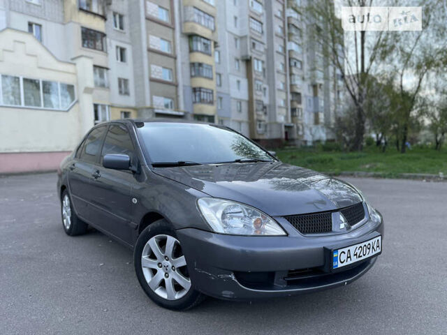 Міцубісі Lancer, об'ємом двигуна 1.58 л та пробігом 250 тис. км за 4950 $, фото 4 на Automoto.ua