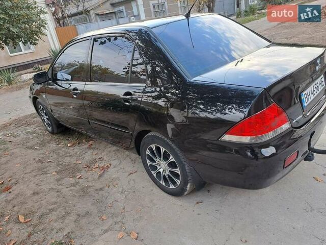 Мицубиси Лансер, объемом двигателя 1.6 л и пробегом 170 тыс. км за 6000 $, фото 28 на Automoto.ua