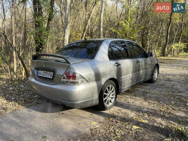 Мицубиси Лансер, объемом двигателя 2 л и пробегом 257 тыс. км за 4350 $, фото 11 на Automoto.ua