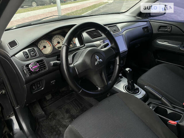 Міцубісі Lancer, об'ємом двигуна 1.58 л та пробігом 188 тис. км за 5400 $, фото 22 на Automoto.ua