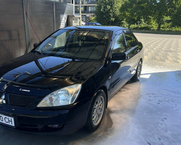 Мицубиси Лансер 2006 в Ужгороде на Automoto.ua Мицубиси Лансер, объемом двигателя 1.6 л и пробегом 320 тыс. км за 3200 $, фото 6 на Automoto.ua