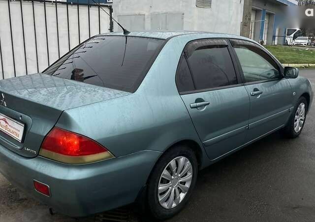 Мицубиси Лансер, объемом двигателя 1.6 л и пробегом 262 тыс. км за 3999 $, фото 6 на Automoto.ua