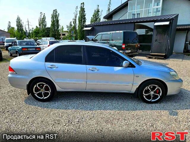 Мицубиси Лансер, объемом двигателя 1.6 л и пробегом 269 тыс. км за 3600 $, фото 1 на Automoto.ua