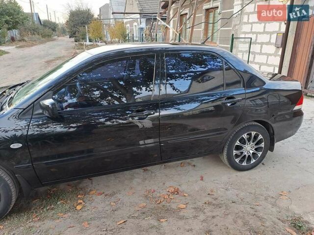 Мицубиси Лансер, объемом двигателя 1.6 л и пробегом 170 тыс. км за 6000 $, фото 20 на Automoto.ua