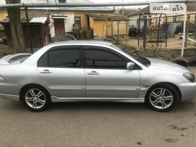 Міцубісі Lancer, об'ємом двигуна 2 л та пробігом 220 тис. км за 5499 $, фото 19 на Automoto.ua