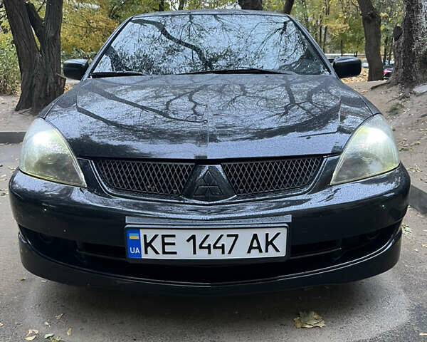 Мицубиси Лансер, объемом двигателя 2 л и пробегом 299 тыс. км за 4950 $, фото 3 на Automoto.ua