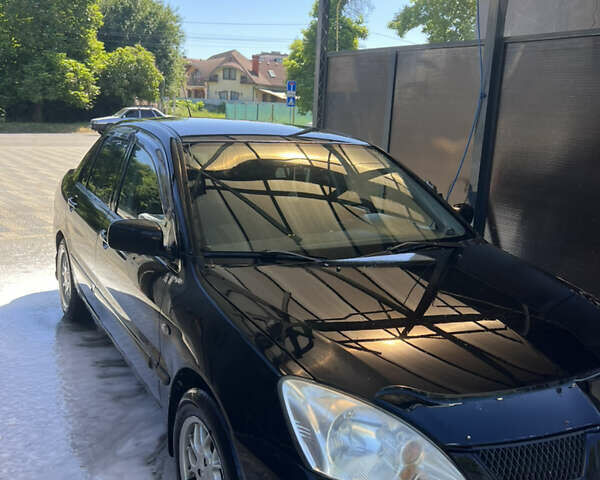 Мицубиси Лансер 2006 в Ужгороде на Automoto.ua Мицубиси Лансер, объемом двигателя 1.6 л и пробегом 320 тыс. км за 3200 $, фото 5 на Automoto.ua