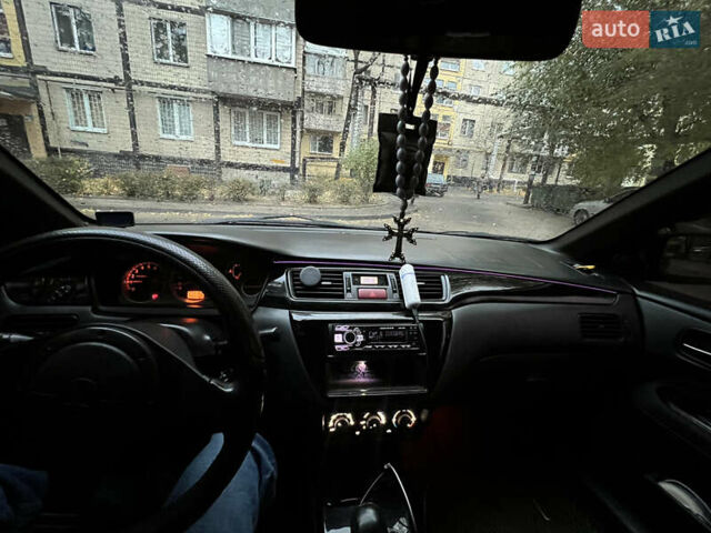 Мицубиси Лансер, объемом двигателя 2 л и пробегом 299 тыс. км за 4950 $, фото 4 на Automoto.ua