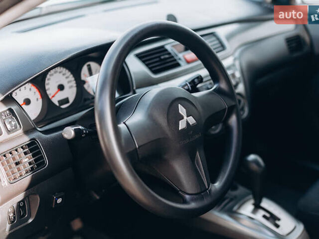 Міцубісі Lancer, об'ємом двигуна 1.6 л та пробігом 160 тис. км за 5800 $, фото 13 на Automoto.ua