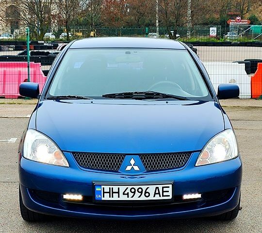 Міцубісі Lancer, об'ємом двигуна 1.6 л та пробігом 195 тис. км за 4700 $, фото 6 на Automoto.ua