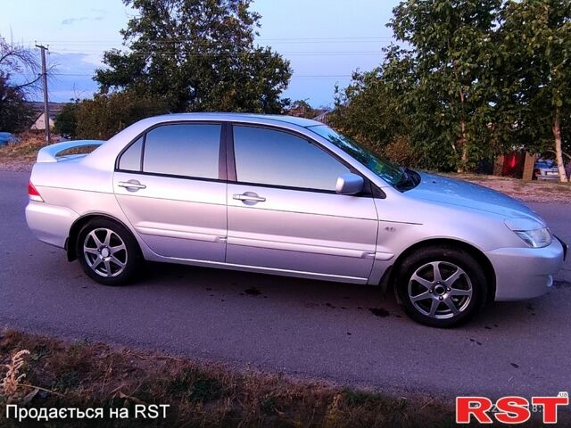 Міцубісі Lancer, об'ємом двигуна 1.6 л та пробігом 296 тис. км за 4000 $, фото 12 на Automoto.ua