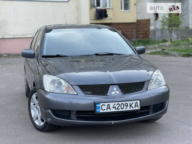 Міцубісі Lancer, об'ємом двигуна 1.58 л та пробігом 250 тис. км за 4950 $, фото 2 на Automoto.ua