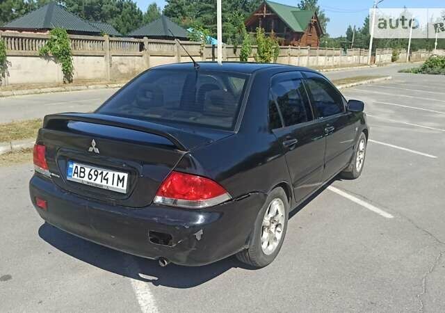 Міцубісі Lancer, об'ємом двигуна 1.6 л та пробігом 237 тис. км за 3999 $, фото 4 на Automoto.ua