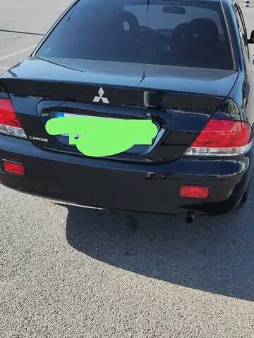 Мицубиси Лансер, объемом двигателя 1.6 л и пробегом 132 тыс. км за 5490 $, фото 3 на Automoto.ua