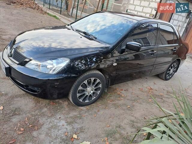 Мицубиси Лансер, объемом двигателя 1.6 л и пробегом 170 тыс. км за 6000 $, фото 27 на Automoto.ua