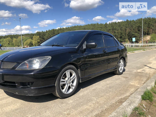 Міцубісі Lancer, об'ємом двигуна 2 л та пробігом 260 тис. км за 4900 $, фото 9 на Automoto.ua