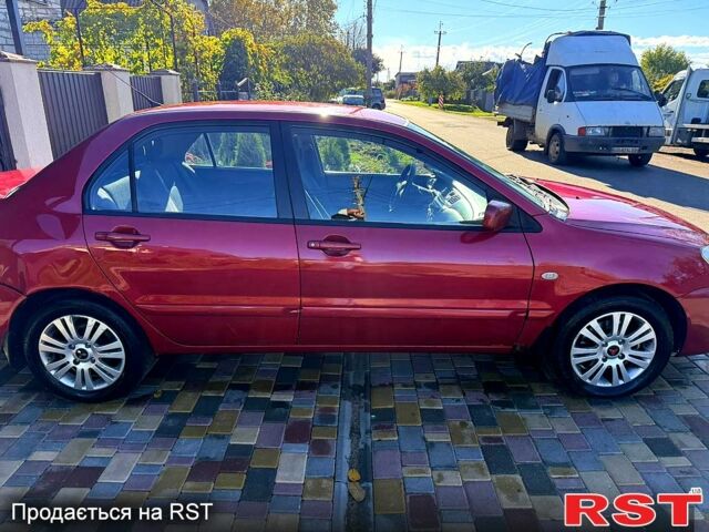 Мицубиси Лансер, объемом двигателя 1.6 л и пробегом 260 тыс. км за 3200 $, фото 2 на Automoto.ua