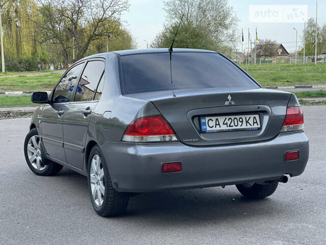 Міцубісі Lancer, об'ємом двигуна 1.58 л та пробігом 250 тис. км за 4950 $, фото 1 на Automoto.ua