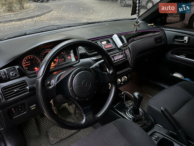 Мицубиси Лансер, объемом двигателя 2 л и пробегом 299 тыс. км за 4950 $, фото 1 на Automoto.ua