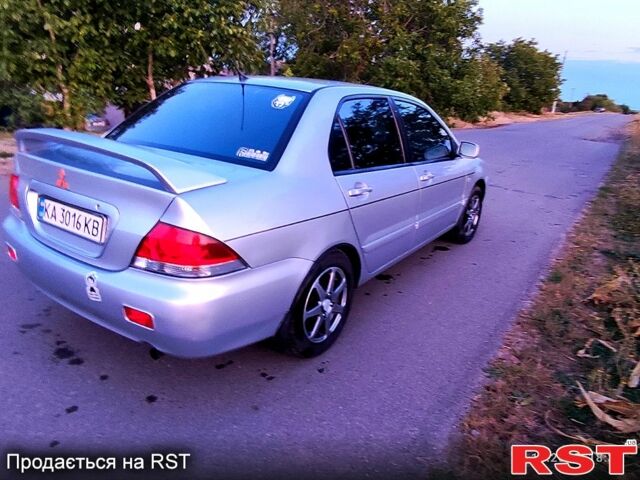 Міцубісі Lancer, об'ємом двигуна 1.6 л та пробігом 296 тис. км за 4000 $, фото 11 на Automoto.ua