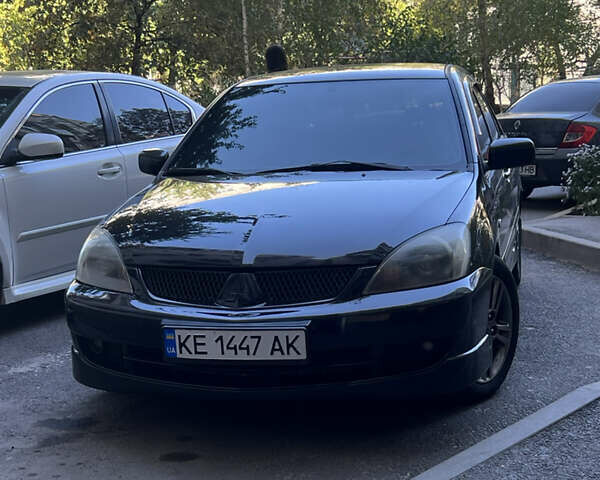 Мицубиси Лансер, объемом двигателя 2 л и пробегом 299 тыс. км за 4950 $, фото 14 на Automoto.ua