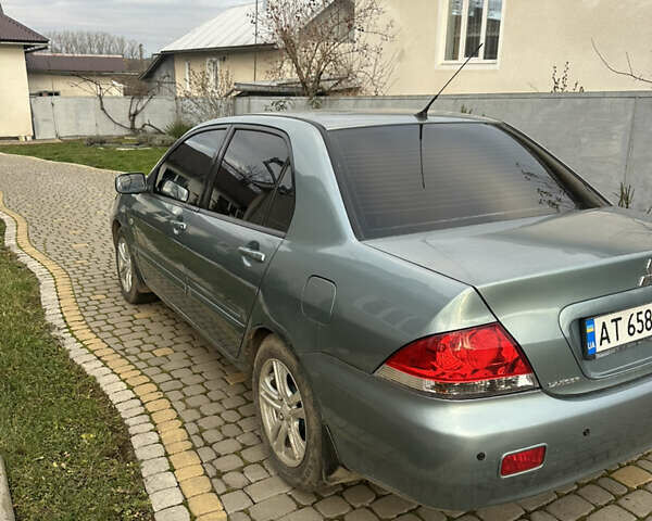 Мицубиси Лансер, объемом двигателя 1.58 л и пробегом 288 тыс. км за 3700 $, фото 4 на Automoto.ua