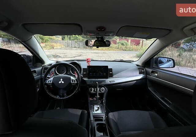 Мицубиси Лансер, объемом двигателя 2 л и пробегом 195 тыс. км за 7300 $, фото 13 на Automoto.ua