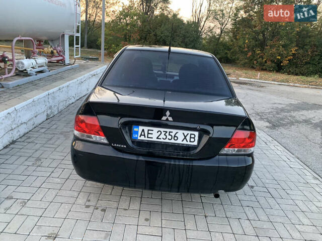 Мицубиси Лансер, объемом двигателя 1.58 л и пробегом 240 тыс. км за 4500 $, фото 1 на Automoto.ua