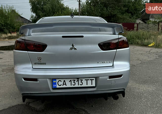Мицубиси Лансер, объемом двигателя 2 л и пробегом 195 тыс. км за 7300 $, фото 7 на Automoto.ua