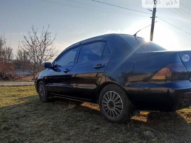 Міцубісі Lancer, об'ємом двигуна 1.6 л та пробігом 206 тис. км за 4400 $, фото 8 на Automoto.ua