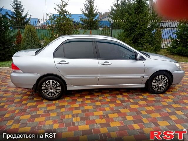 Мицубиси Лансер, объемом двигателя 1.6 л и пробегом 230 тыс. км за 3800 $, фото 2 на Automoto.ua