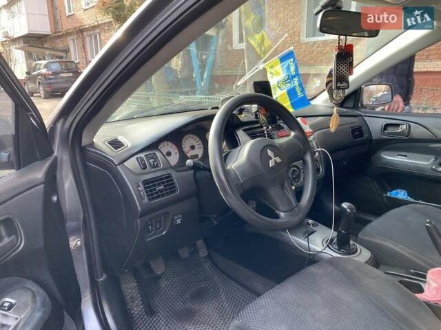 Міцубісі Lancer, об'ємом двигуна 1.58 л та пробігом 252 тис. км за 4799 $, фото 11 на Automoto.ua