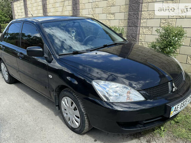 Міцубісі Lancer, об'ємом двигуна 1.58 л та пробігом 165 тис. км за 4900 $, фото 3 на Automoto.ua