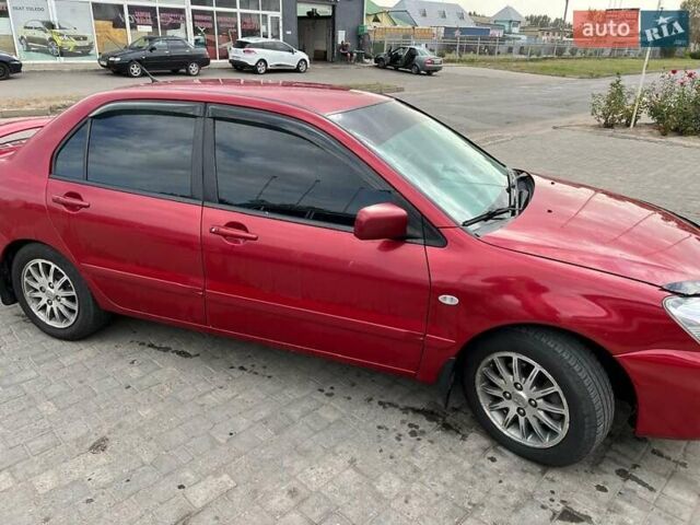 Мицубиси Лансер, объемом двигателя 1.58 л и пробегом 210 тыс. км за 4800 $, фото 8 на Automoto.ua